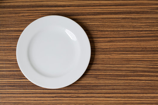 Plate on Wood background