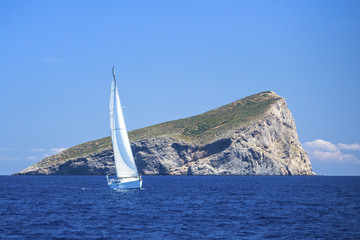 Fototapeta na wymiar Sailing near islands in the Aegean Sea. Luxury yachts.