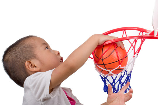 Close-up Asian Boy Playing Basketball Isolated On White