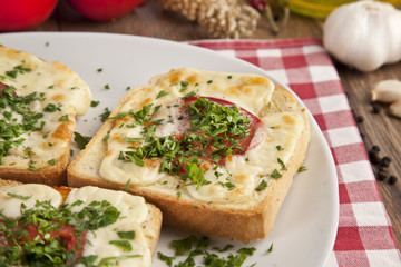 Fototapeta na wymiar Toasted Cheese and Garlic Bread with Parsley