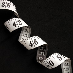 White Tape measure with centimeters and inches