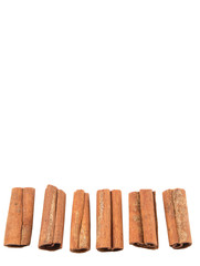 Cinnamon sticks over white background