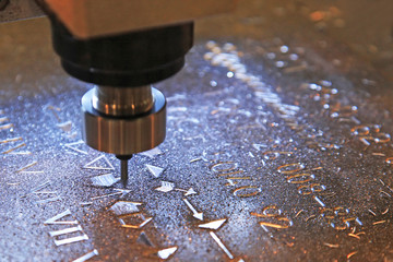 Machine for milling marks on metal