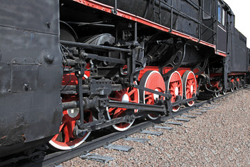 Obraz premium the wheels of an old steam engine