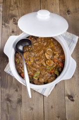 hungarian beef goulash with red and green paprika