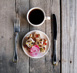 Turkish Delight, a cup of coffee with a fork and knife