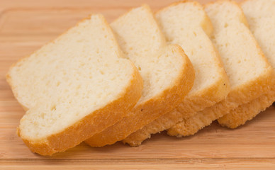Slices bread on a wooden table