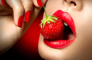 Foto op Plexiglas Sexy Woman Eating Strawberry. Sensual Red Lips © Subbotina Anna