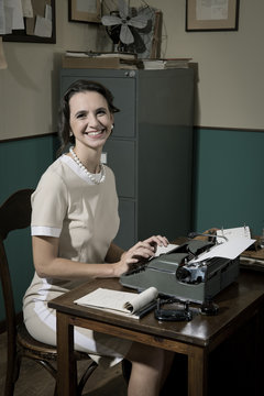 Young vintage secretary at work