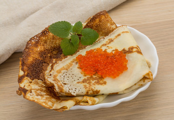 Pancakes with red caviar
