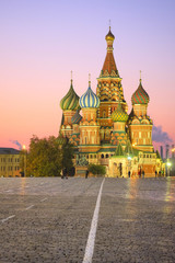 Cityscape with the image of night St. Basil Cathedral in Moscow