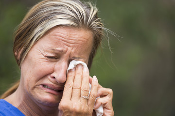 Crying woman stressed in grief