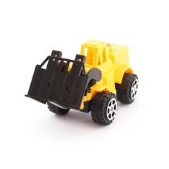 Yellow and black toy forklift on white background
