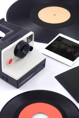 Obraz premium old instant camera with vinyl and instant photos - eighties