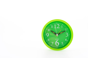 Green clock isolated on white background