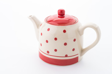 Polka dot tea pot isolated on white background