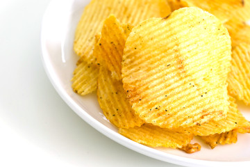 Potato chips isolated on white background