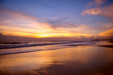 Fototapeta na wymiar sandy beach and a beautiful sunset