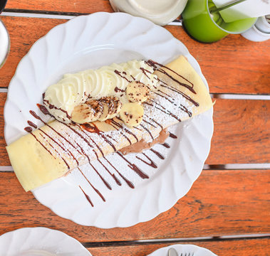 Cold crape with ice-cream chocolate and banana