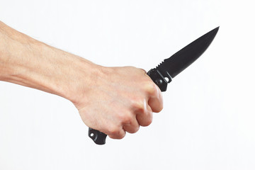 Hand with a army knife on a white background