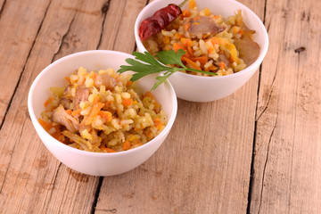 Chinese rice in a bowl on a wooden table