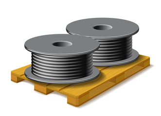 Coils with a black cord are on a wooden pallet.