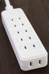 Close - up white extension power strip