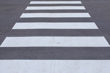 Close - up zebra crossing from empty street