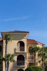 Arches in Plaster Hotel with Palm Trees