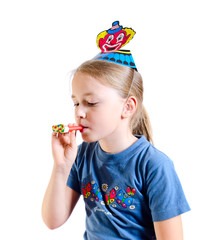 the girl in a cap blows in a whistle