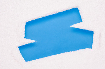 Scratched snow on window