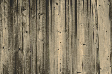 the dark wood texture with natural patterns