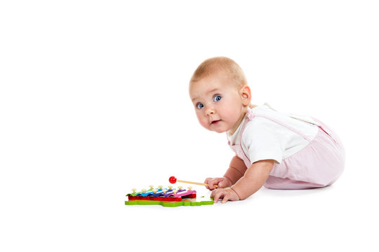 Baby Playing With Musical Toys