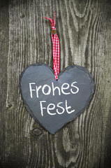 Herz aus Schiefer mit Frohes Fest