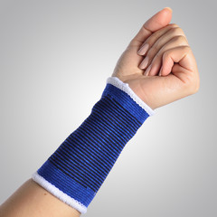hand with a orthopedic wrist brace