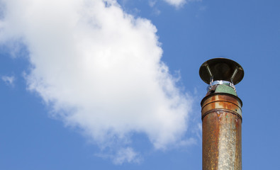 Metal pipe against the sky.