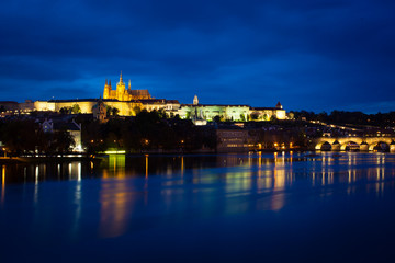 Fototapeta na wymiar View of Vltava river with Charles bridge and Prague castle
