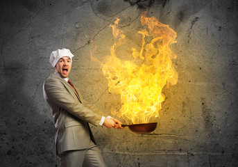 Businessman with pan