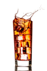 Ice splashing in cup of tea
