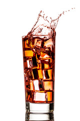 Ice splashing in cup of tea