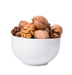 Close up of walnuts bunch in bowl.