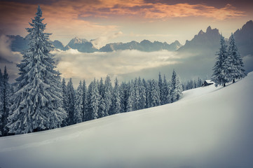 Obraz premium Beautiful winter sunset in the mountains.