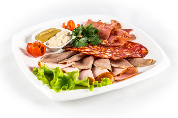 sliced  meat with vegetables