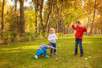 Fototapeta premium happy kids jumping in the park, joy, emotion