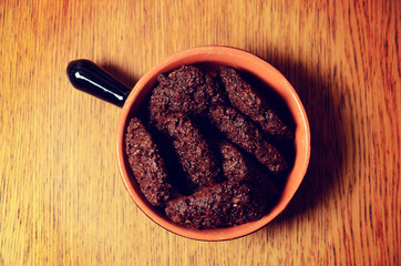 Home-made chocolate cookies on a table.