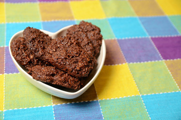 Home-made chocolate cookies on a table.