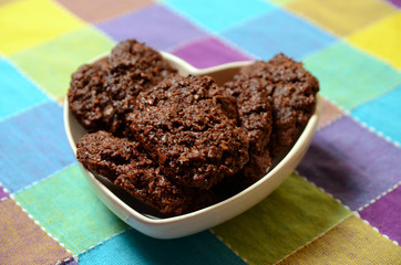 Home-made chocolate cookies on a table.