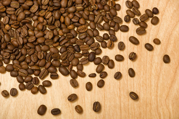 coffee seeds on wooden background