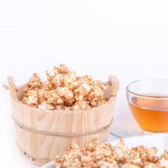 caramel popcorn on white background