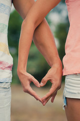 Two hands make a heart together